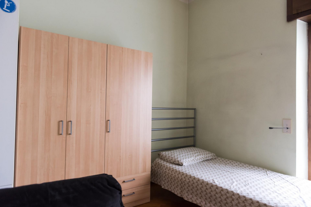Bed in a twin bedroom near Politecnico University