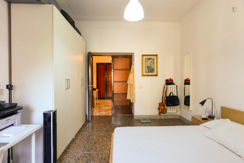 Bright double bedroom with a balcony, near the large Villa Ada Savoia park