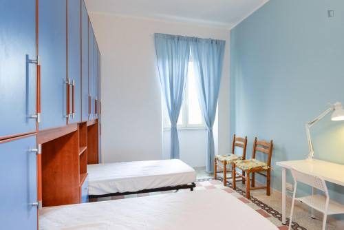 Bed in twin bedroom in Quartiere XIX Prenestino Centocelle