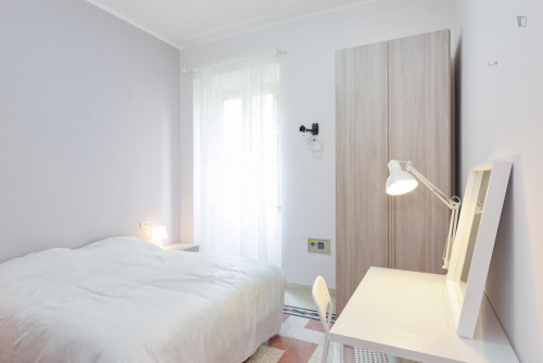 Bed in twin bedroom in Quartiere XIX Prenestino Centocellem, near Mirti metro