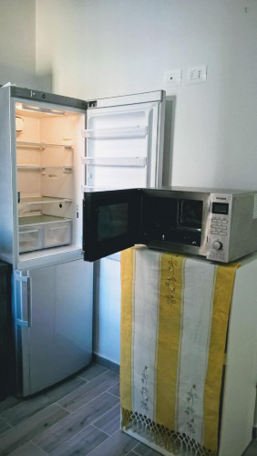 Single bed in a twin bedroom