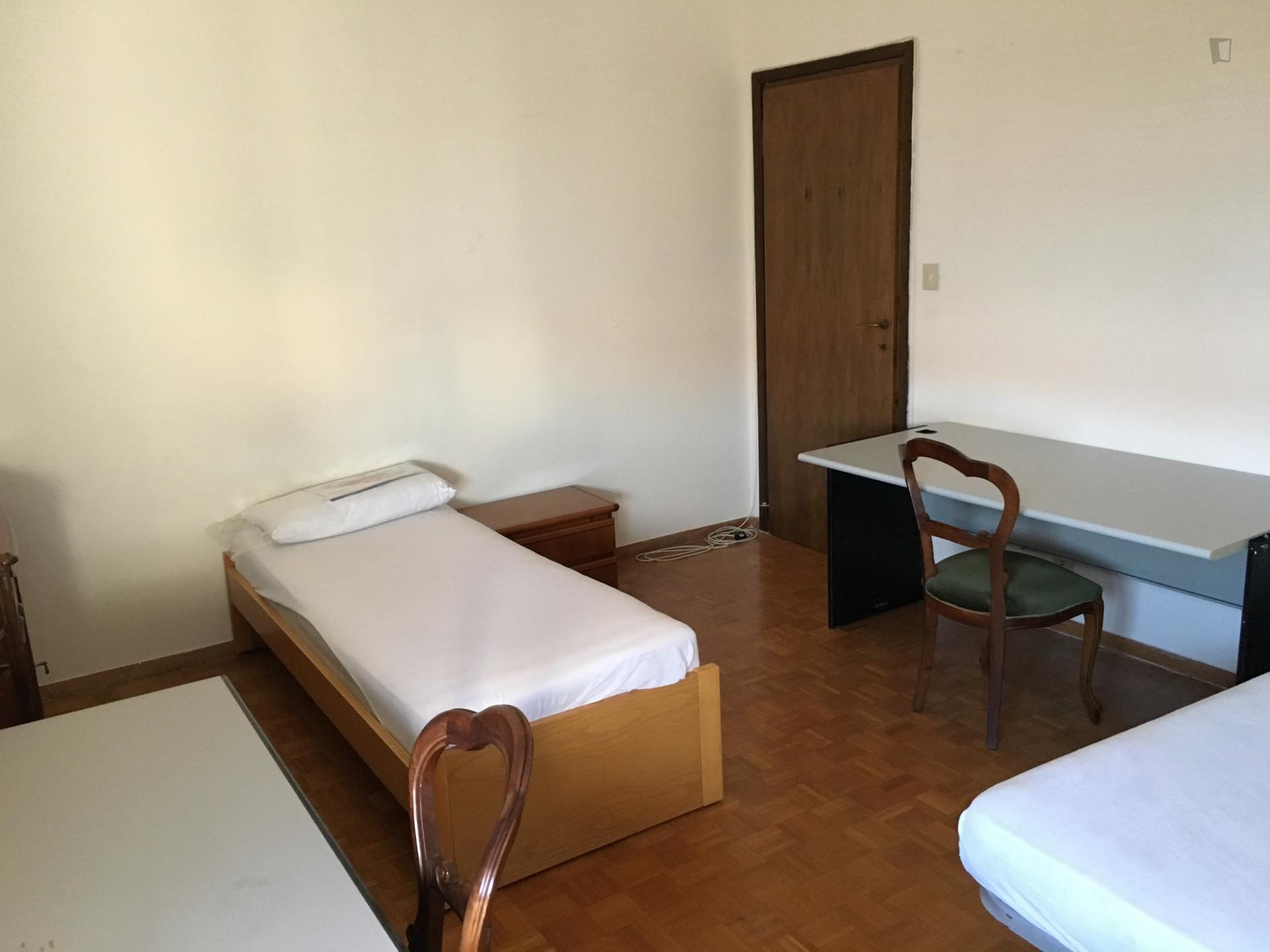 Bed in a twin bedroom close to Porta Sant'Isaia