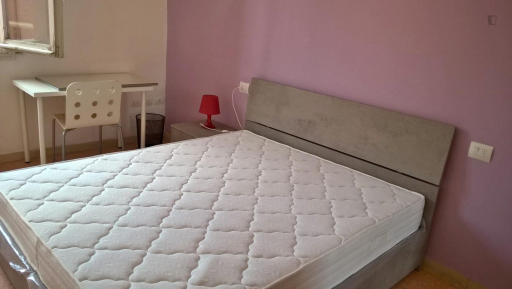 Double bed in a 3 bedroom apartment