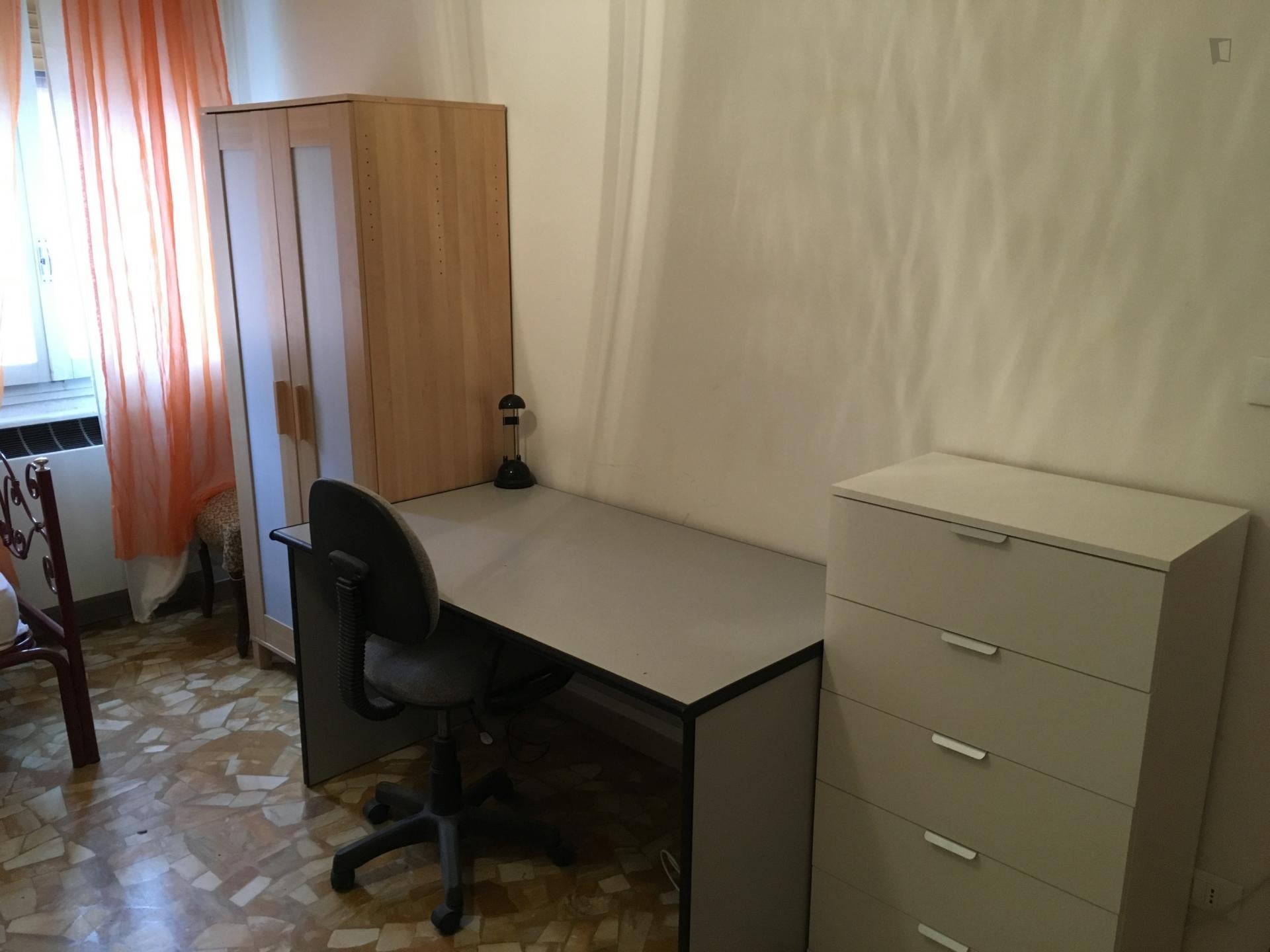 Bed in a twin bedroom in Casalecchio
