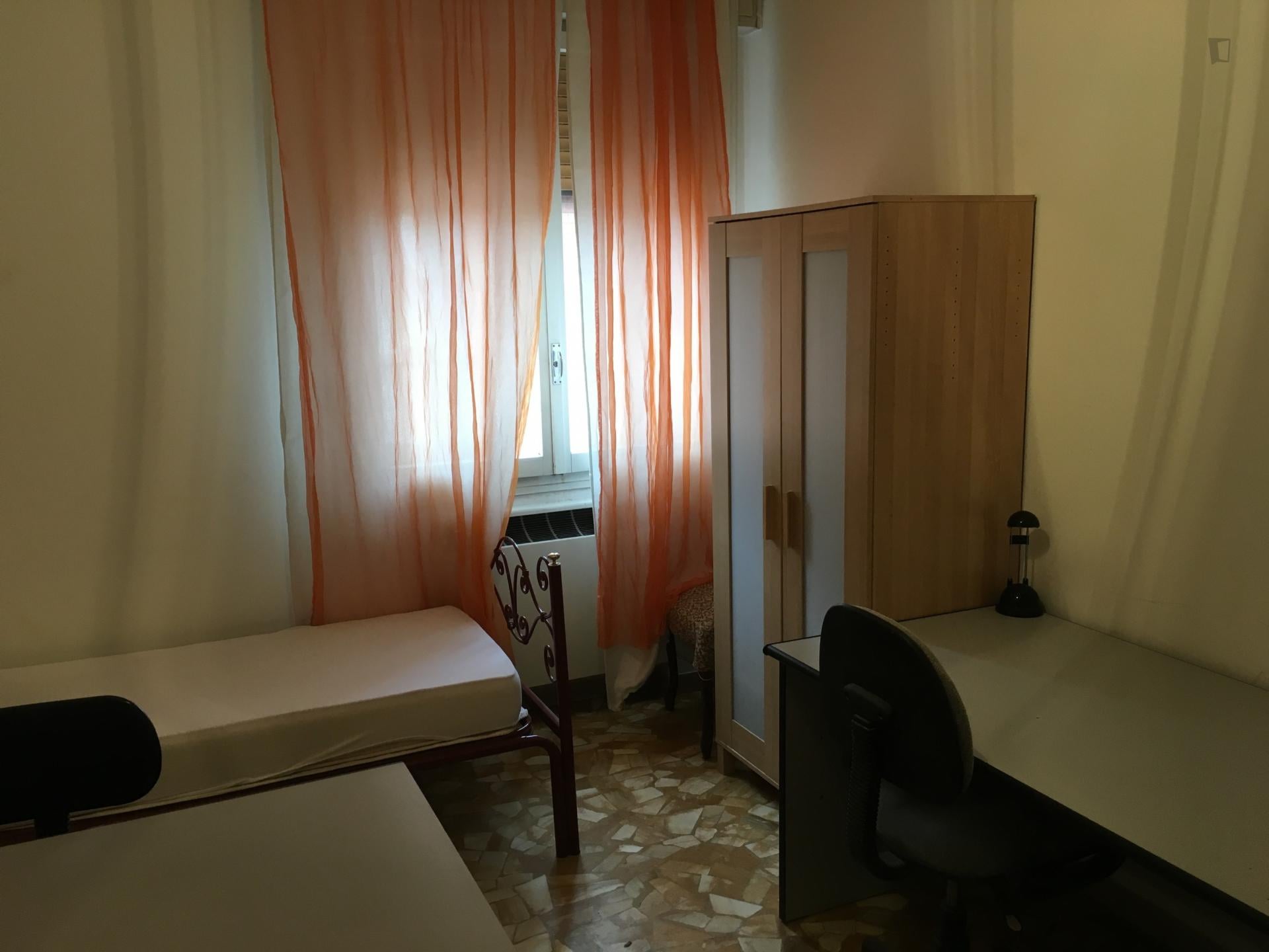 Bed in a twin bedroom in Casalecchio