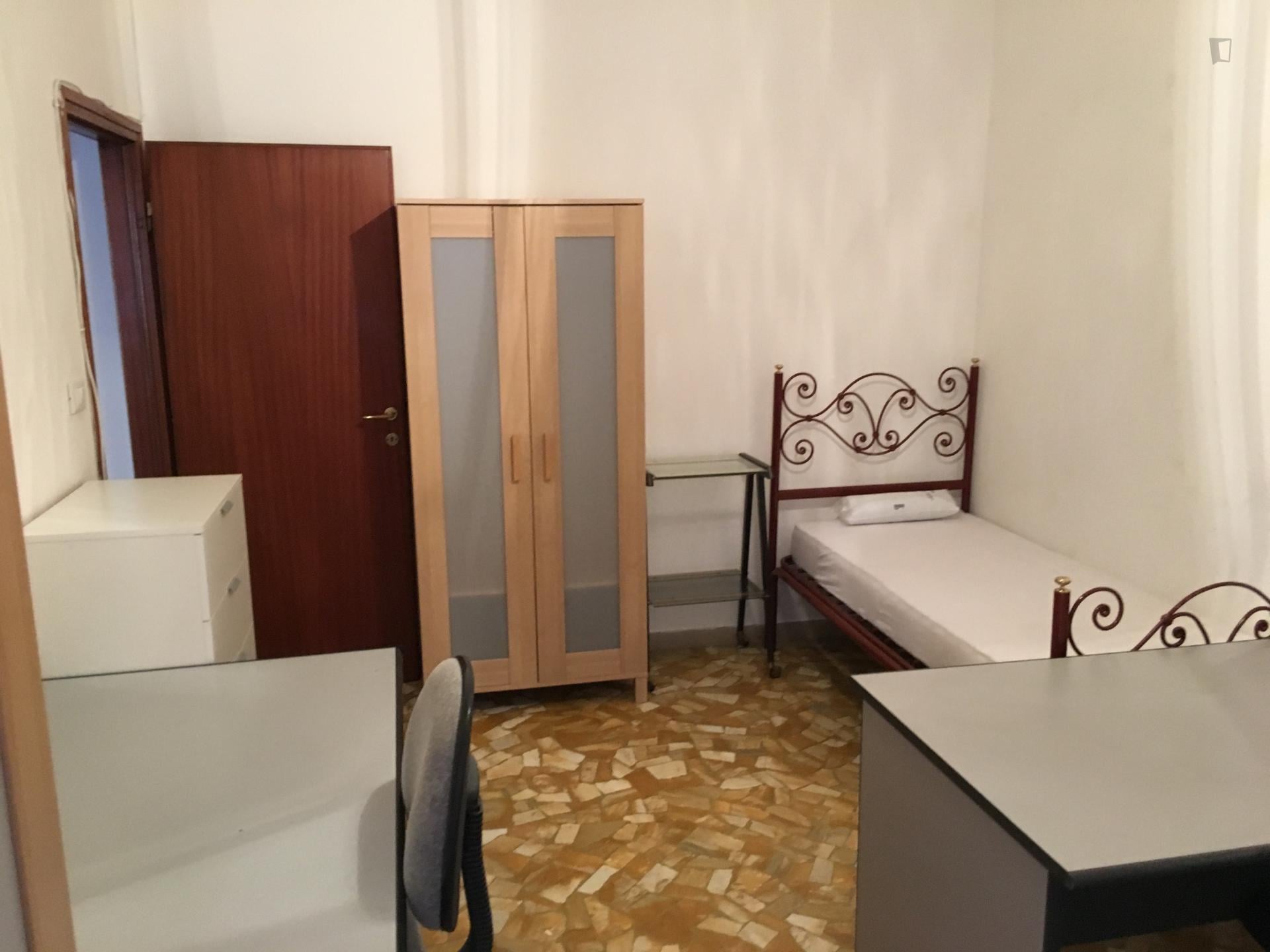 Bed in a twin bedroom in Casalecchio