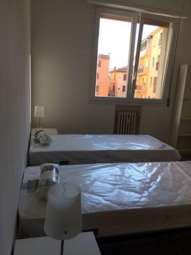 Bed in a twin bedroom in Mazzini neighbourhood