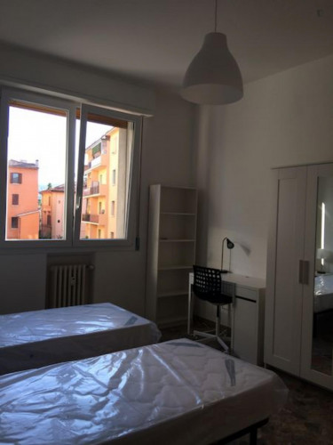 Bed in a twin bedroom in Mazzini neighbourhood