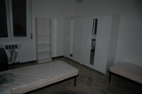 Bed in a twin bedroom close to Bologna Mazzini station