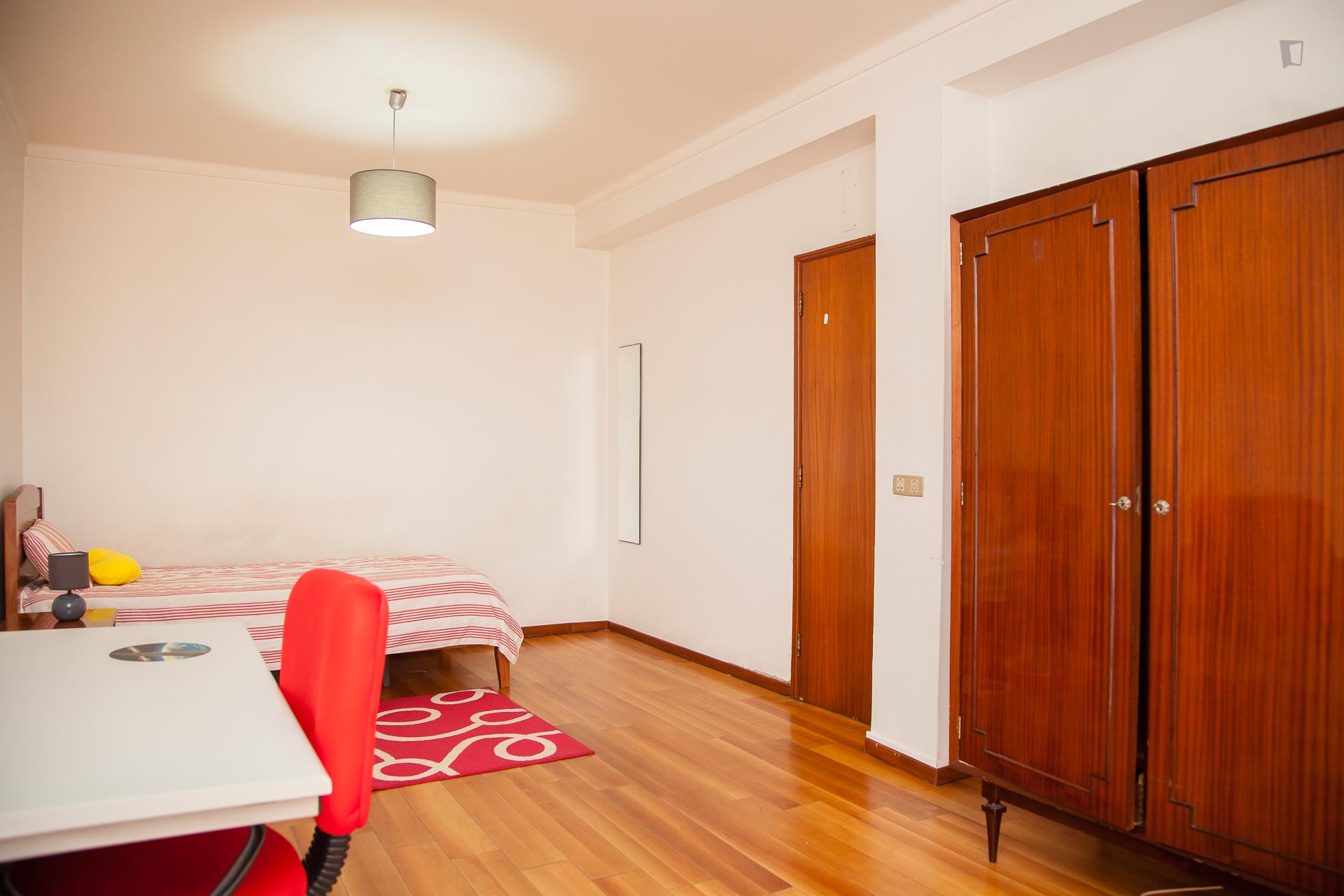 Single bedroom with balcony in a 4 bedroom apartment