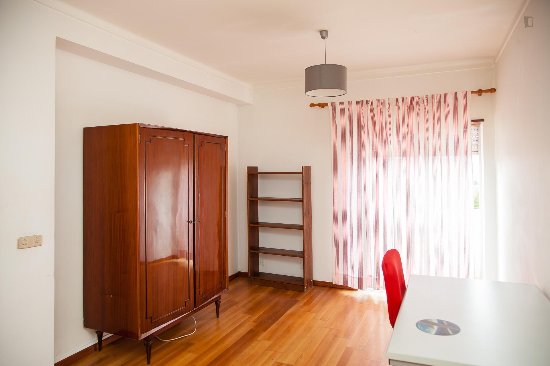 Single bedroom with balcony in a 4 bedroom apartment