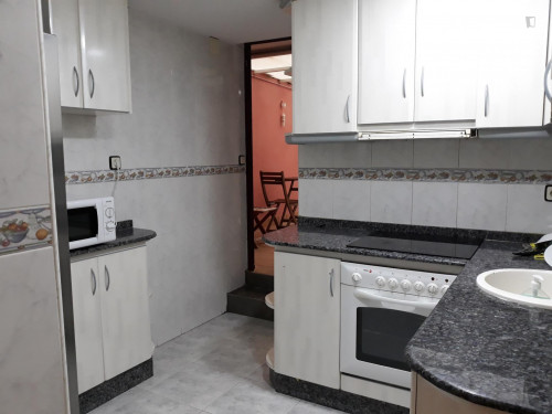 Double bedroom, with private bathroom and balcony, in 4-bedroom house