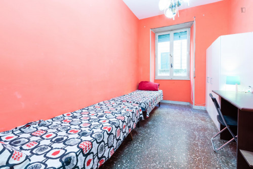 Bed in snug twin bedroom near Garbatella metro station