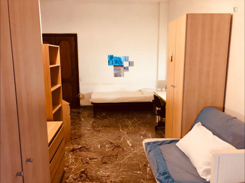 Bed in a twin bedroom close to Parco delle Tre Fontane