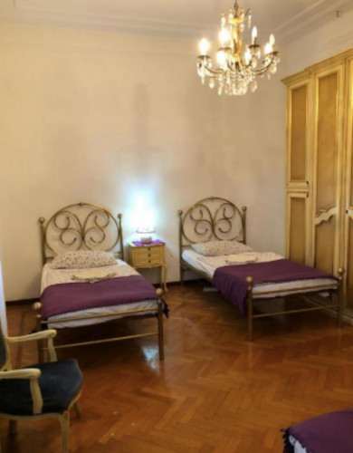 Bright bed in a shared apartment, in Porta Venezia neighbourhood