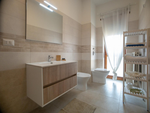 Bed in a twin bedroom in Cologno Monzese