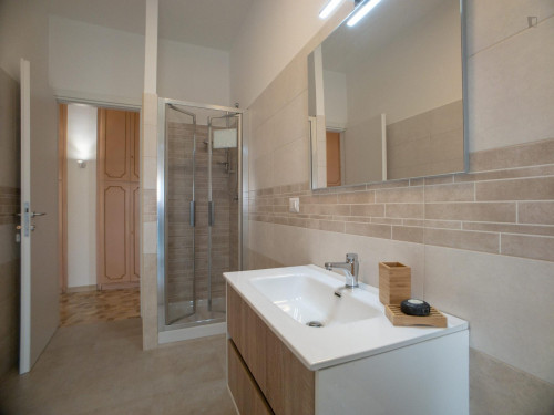 Bed in a twin bedroom in Cologno Monzese