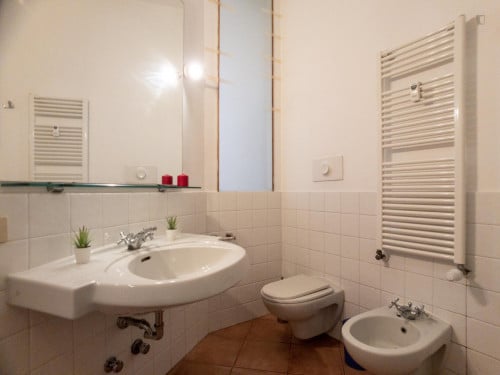 Bed in a twin bedroom in Porta Romana neighbourhood