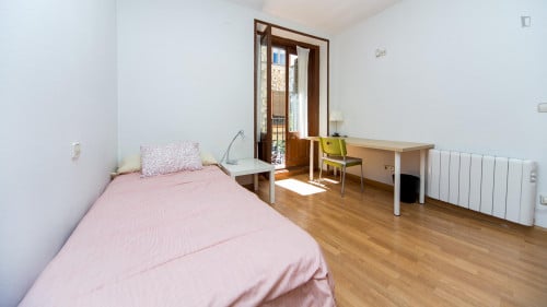 Single bedroom with a nice balcony view in vibrant Embajadores