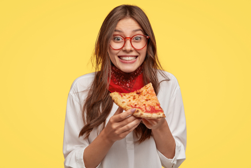 Girl eating Pizza Slice
