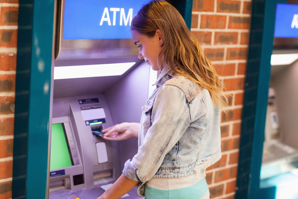 Student withdrawing Money from Bank