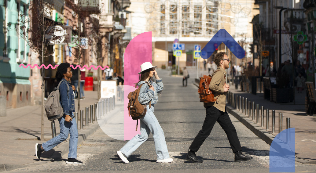 Students with backpacks crossing a city street in poland.